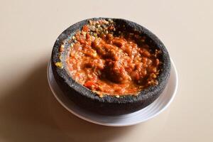 Traditional Indonesian sambal with tomato chili and shrimp paste photo