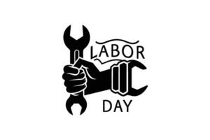 Labor day logo with a wrench in the hand vector