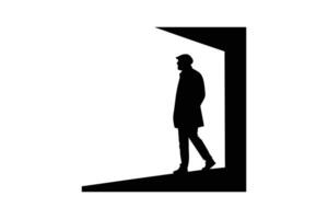 Silhouette of man walking in a doorway vector