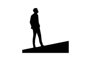 Silhouette of man standing on top of hill vector