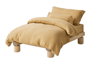 Cozy bed with wooden frame and soft yellow bedding, including pillows and duvet, creates warm and inviting atmosphere png