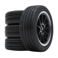 Stack of four black car tires with sleek alloy rims is displayed, showcasing their tread pattern and modern design. tires are arranged neatly, emphasizing their quality and durability png