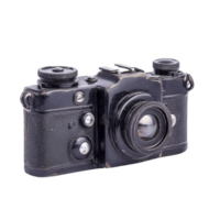 Vintage black camera with textured body and lens, showcasing classic design and mechanical details. camera evokes nostalgia and is symbol of traditional photography png