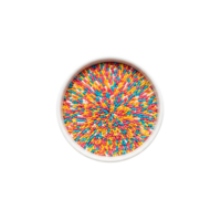A white ceramic bowl overflowing with rich dark chocolate chips creating a tempting dessert ingredient isolated on transparent png