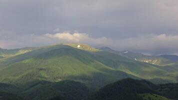 Time-Lapse of Weather Shifts Over Forested Carpathian Ridges, Sunlight Dances on Verdant Slopes video