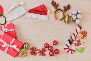 Christmas decorations arranged in a circle on a wooden table photo