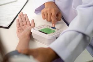 Digital Health Monitoring. Doctor explaining blood pressure results using a digital device. photo
