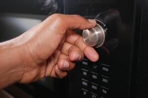 Adjusting microwave settings for cooking time photo