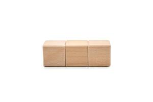 Three Blank Wooden Blocks for Custom Text or Icons. Wood blocks arranged horizontally isolate on white background with clipping path. ideal for adding custom text, numbers or symbols. photo