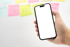 Hand Holding Smartphone with Blank Screen for Mockup and App Presentation. perfect for app presentation, UI UX design, advertising, and product mockup. Copy space. photo