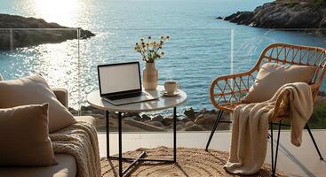 freedom of a digital nomad's life, working on a laptop with a serene sea view photo