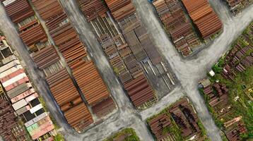 Aerial view of steel manufacturing facility. Metal construction materials and rebar storage yards for industrial building supply and infrastructure development. Industrial steel factory. Metal stock. photo