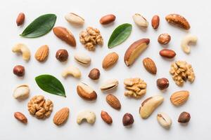 Composition of nuts , mix hazelnuts, cashews, almonds on table. healthy eating concepts photo