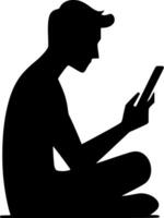 Silhouette of a man sitting on the floor with a tablet computer vector