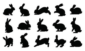 Silhouettes of rabbits in various poses vector