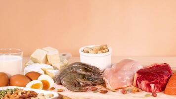 Variety of protein-rich foods displayed on table video