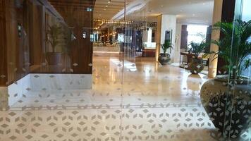 Automatic doors open to reveal a luxurious lobby video
