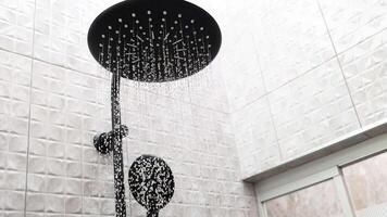 Water flowing from a showerhead in Thailand video