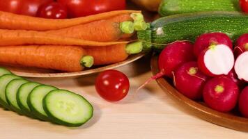 Assorted vegetables arranged on a white background video