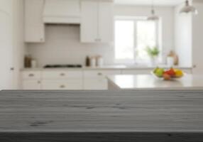 A table top in front of a kitchen photo