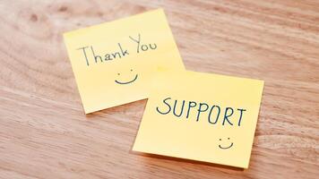 Appreciation notes expressing support office desk warm close-up gratitude concept photo