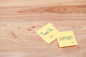 Thank you notes for support office desk warm environment close-up gratitude concept photo