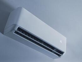 Modern Air Conditioner Unit on White Wall photo