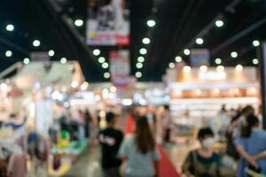Trade show event convention center exhibition space urban environment blurred view networking opportunities photo