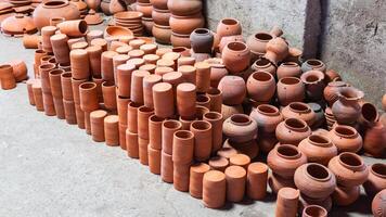 Clay pottery crafting event artisan workshop handmade terracotta indoor studio close-up cultural heritage photo