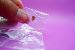 Severely Decayed Tooth Preserved in Plastic Bag photo