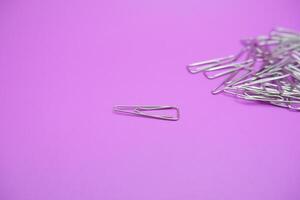 Unique Shaped Paper Clips in a Pile photo