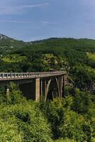 Amazing view of the Durdevica Tara Bridge over the Tara river canyon, Montenegro. photo