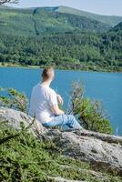 Serene Lake View A Moment of Uninterrupted Reflection and Peace in Natures Embrace photo