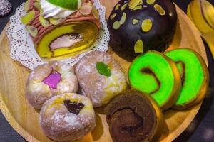 A plate of different pastries on a table photo