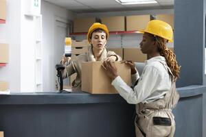 Warehouse activity with diverse employees scanning and registering merchandise, ensuring inventory management and stock control with bar code identification. Import export services. photo