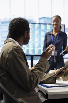 Diverse marketing team presenting a detailed reports analysis of recent campaigns, utilizing infographics and digital marketing insights to optimize future strategies and improve ROI. photo