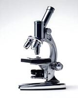 Close-up of advanced microscope in modern laboratory. Medical Research Laboratory with Microscope and Scientist Silhouette. microscope on a white background. photo