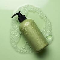Green Shampoo Bottle in Bubbles, Product Still Life with Soapy Backdrop photo