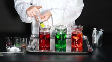 Science experiment with colorful liquids and dry ice video