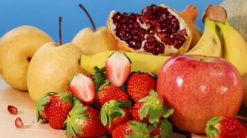 Vibrant fruits displayed with focus on pomegranate video
