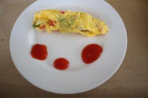 A plate with a face on it photo