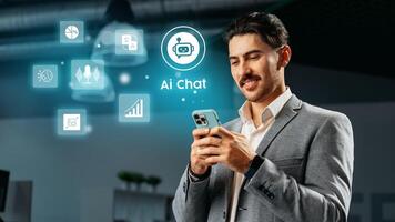 Professional man engaging with AI chat technology in a modern office environment during the day photo