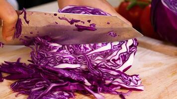 Slicing fresh cabbage into thin strips video