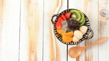 Mitsumame Mixture of Boiled Beans, Agar Cubes, Fruit Pieces, and Syrup. Japanese Food Confectionery photo