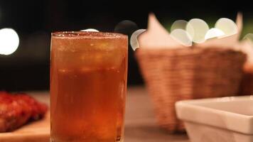 Cold beer glass with appetizers in a cozy setting. video