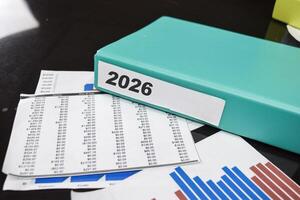 Folders with the label 2026. Business management concept photo