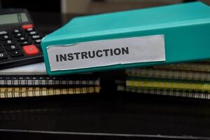 Folders with the label Instruction. Business management concept photo