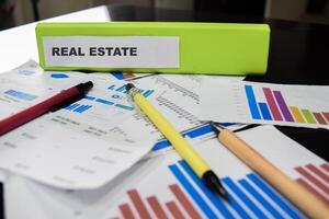 Folders with the label Real estate. Business management concept photo