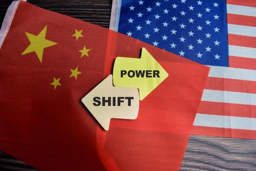 Concept of Power shift write on sticky notes with united state flag and china flag isolated on Wooden Table. photo