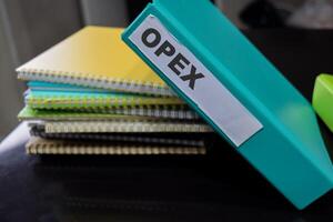 Folders with the label opex. Business management concept photo